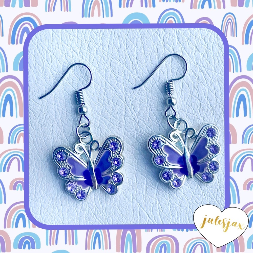 NWT silver 🦋 purple 💜butterfly 🦋 earrings